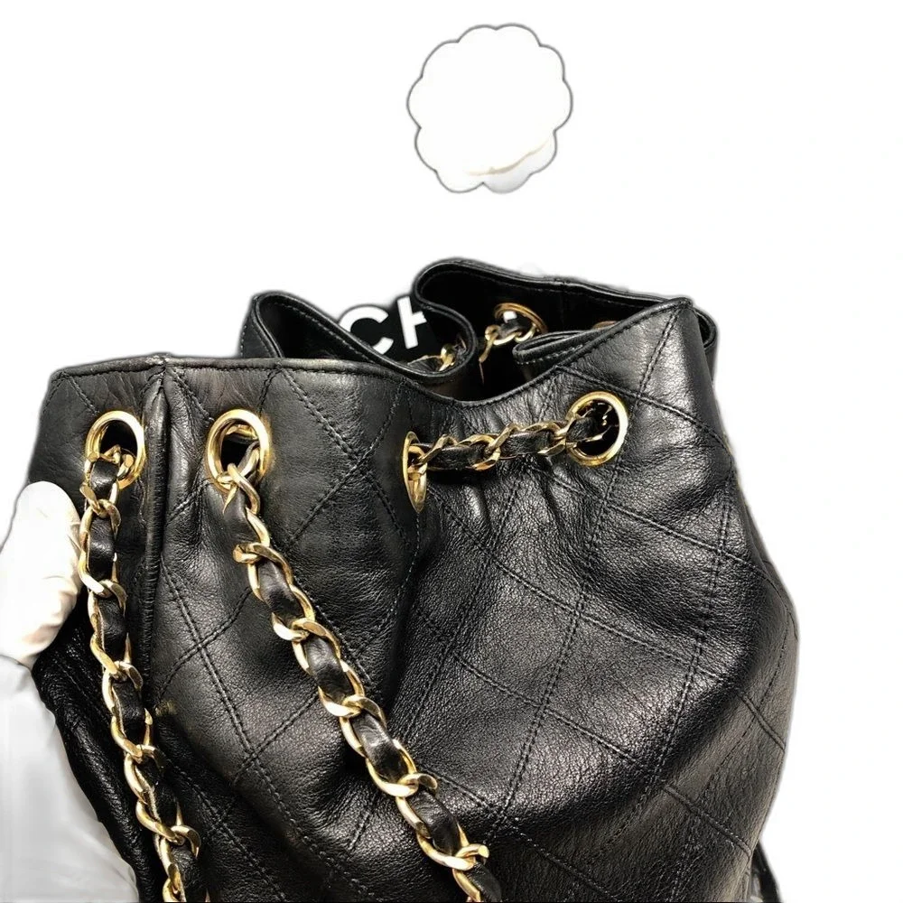 Vintage Chanel Black Lambskin Quilted CC Drawstring Bucket Bag Leather Backpack